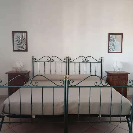 Δωμάτια σε οικογενειακή κατοικία Momenti *